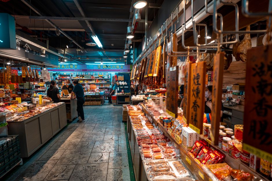 Captivating view of an Asian grocery store interior with diverse food selections.