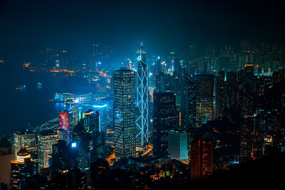 A captivating night cityscape of Hong Kong's illuminated skyline from Victoria Peak.